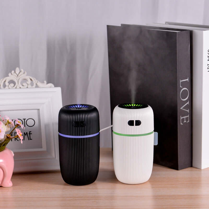 Sleep Aid White Noise Humidifier, a black and white unit enhances relaxation for restful sleep with white noise humidifier for sleep.