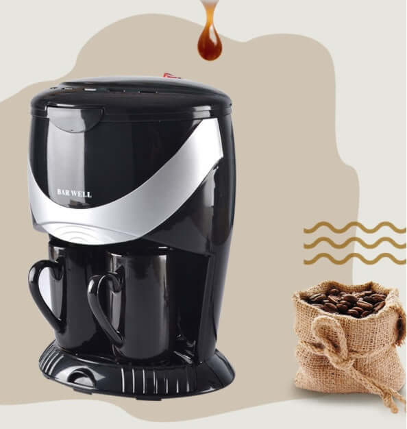 Automatic American coffee machine featuring double cup design and included coffee cups and spoon.