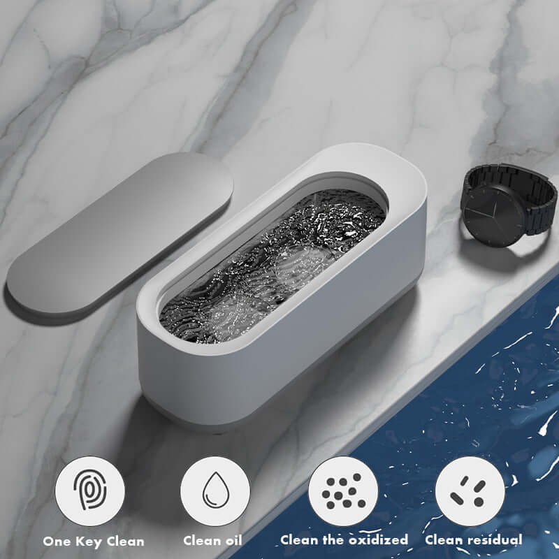 Ultrasonic jewelry cleaner with high-frequency vibration for cleaning jewelry, glasses, watches, and more.