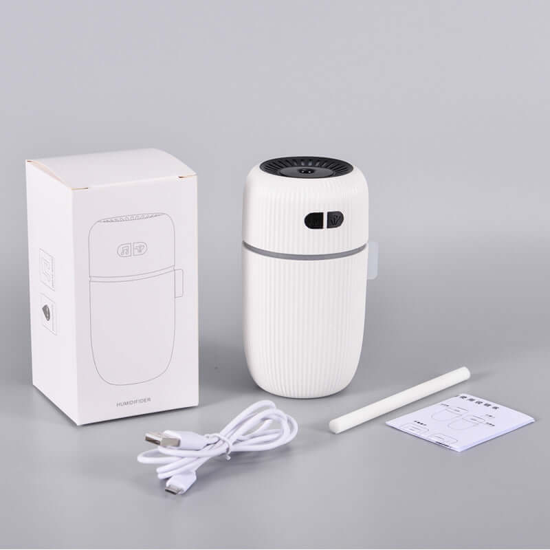 Sleep Aid White Noise Humidifier with USB cable and instruction manual for enhanced restful sleep.