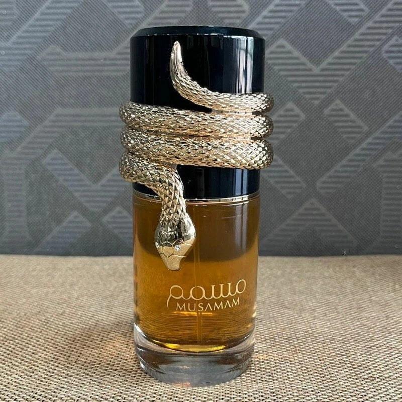 Premium Arabic Musamam Perfume in stylish bottle with snake design, 100ml unisex long lasting fragrance.