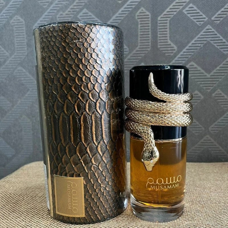 Premium Arabic Musamam perfume in stylish packaging with snake design, 100ml unisex fragrance for men and women.
